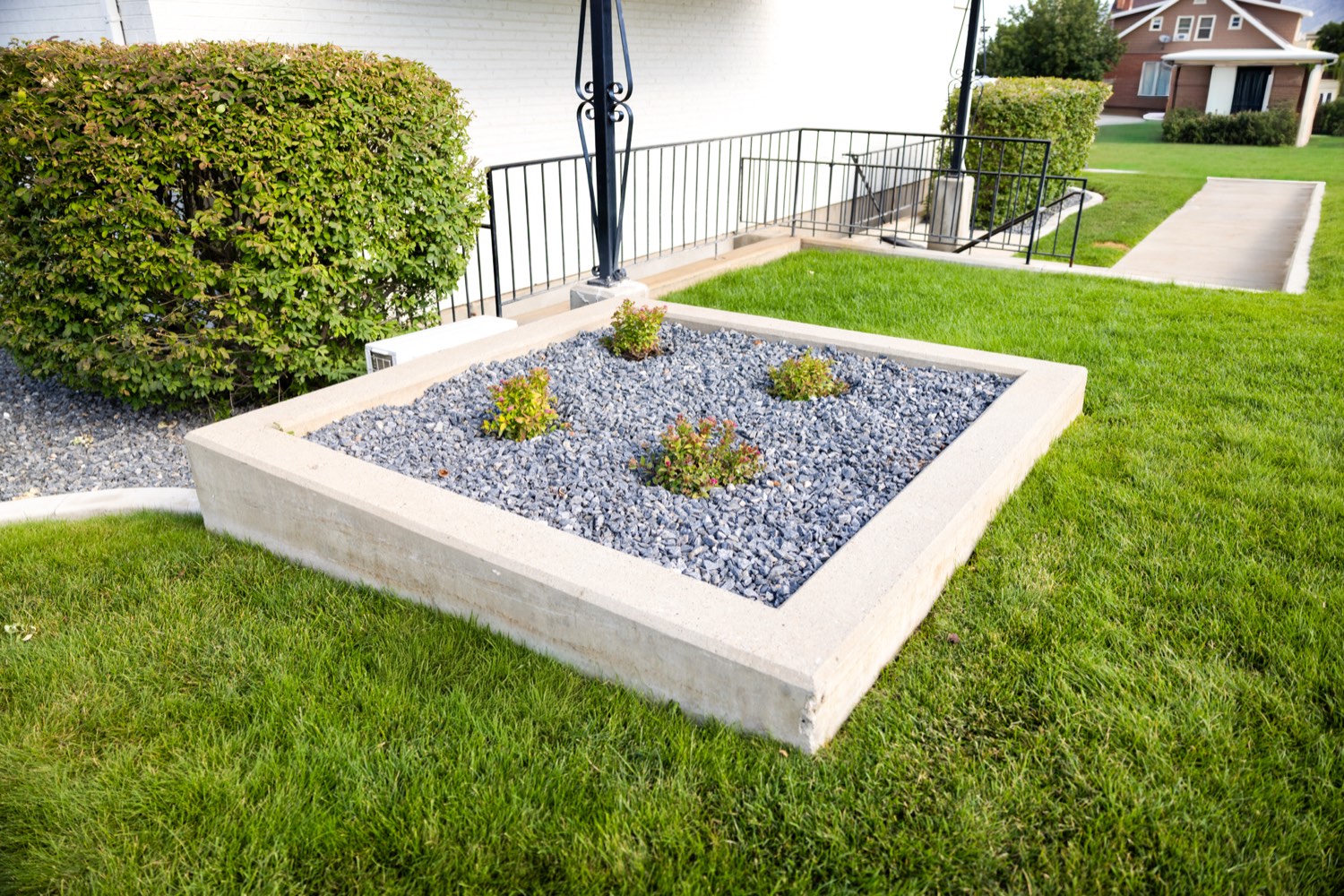 Raised concrete planter and curbing